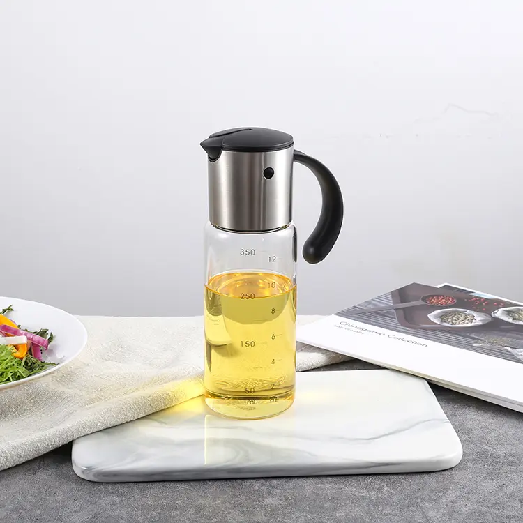Gravity-based oil dispenser features