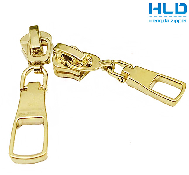 Hengda Factory Customized Type 5 Zipper Puller Gold Zipper Puller Pull Lock Head Zipper Slider And Puller