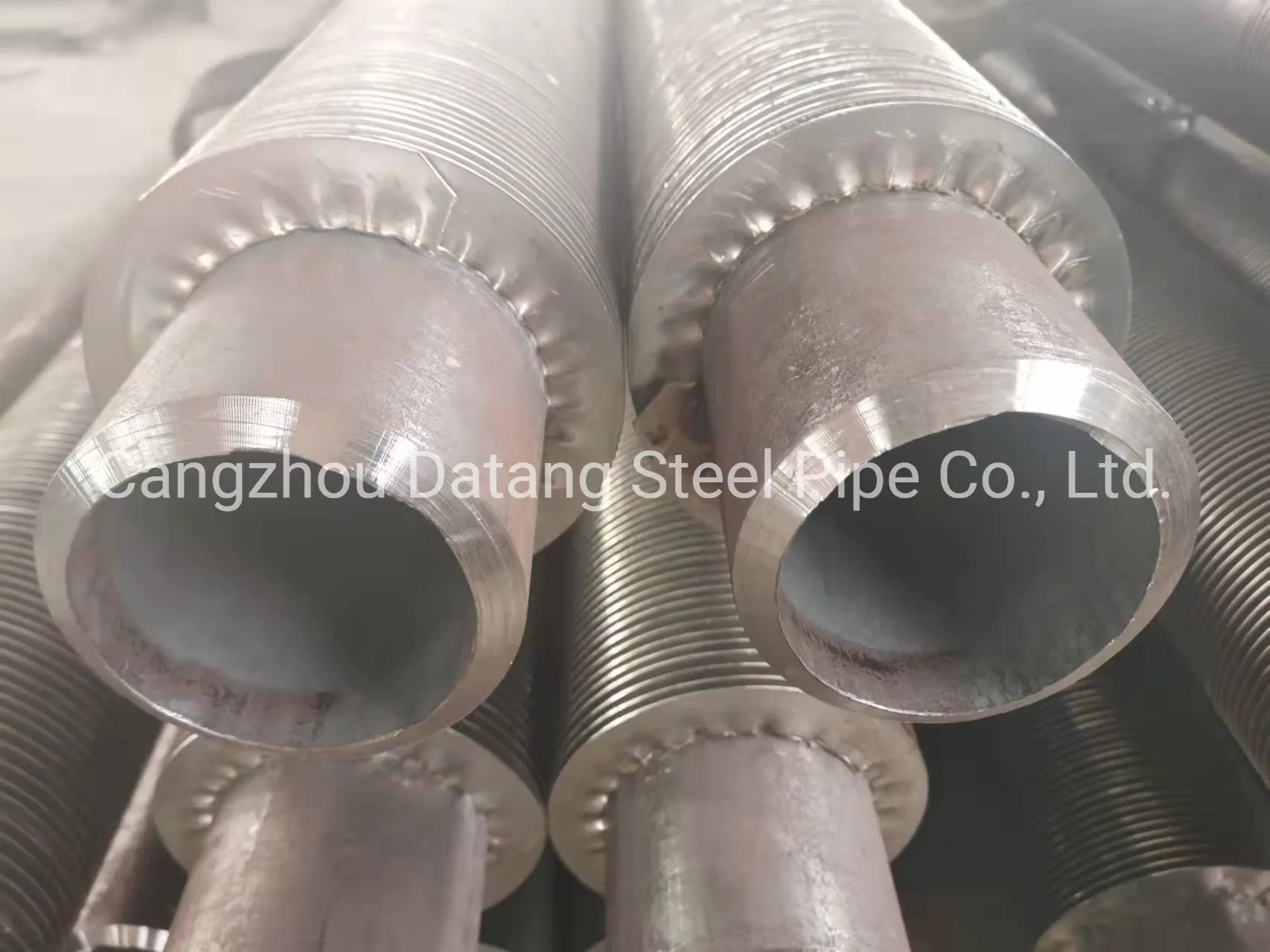 Fábrica de suministro de tubos de aletas enrolladas en espiral de acero inoxidable con alta frecuencia, tubos de aletas de aluminio/cobre, producción en masa