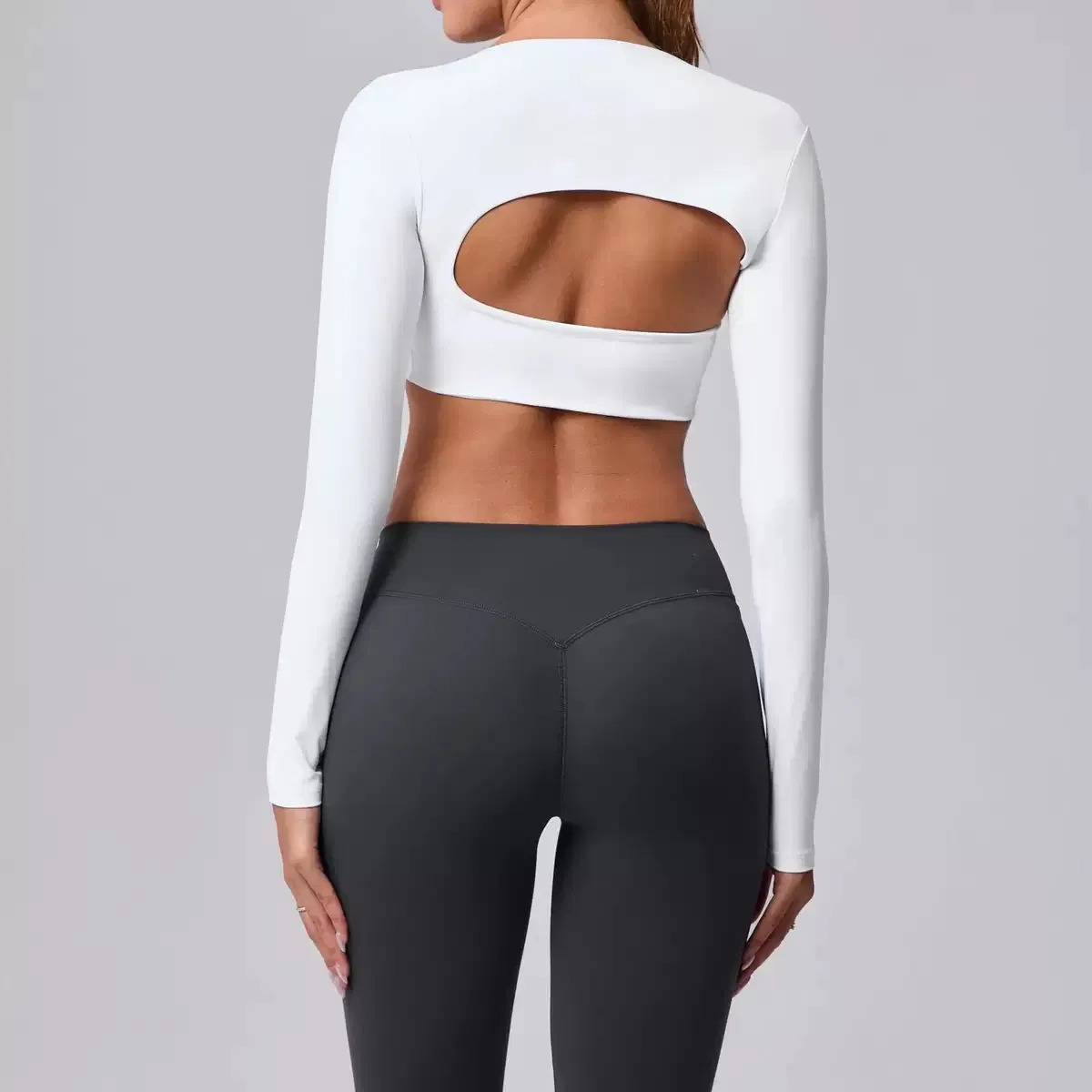 Novo Design Mais Quente Sexy Blusa de Manga Longa Cropped com Sutiã Embutido para Mulheres, Corte Fashion Elegante Costas Recortadas Camiseta Cropped para Treino Yoga e Pilates Tops de Fitness