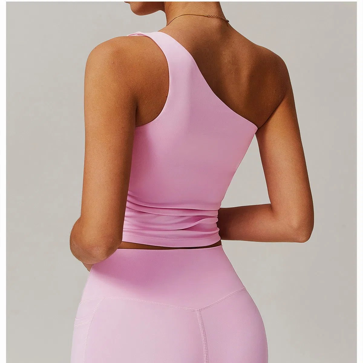 Novo Design Top Cropped Assimétrico Secagem Rápida Alta Elasticidade Camisetas de Ginástica Shockproof Top Cropped com Almofadas