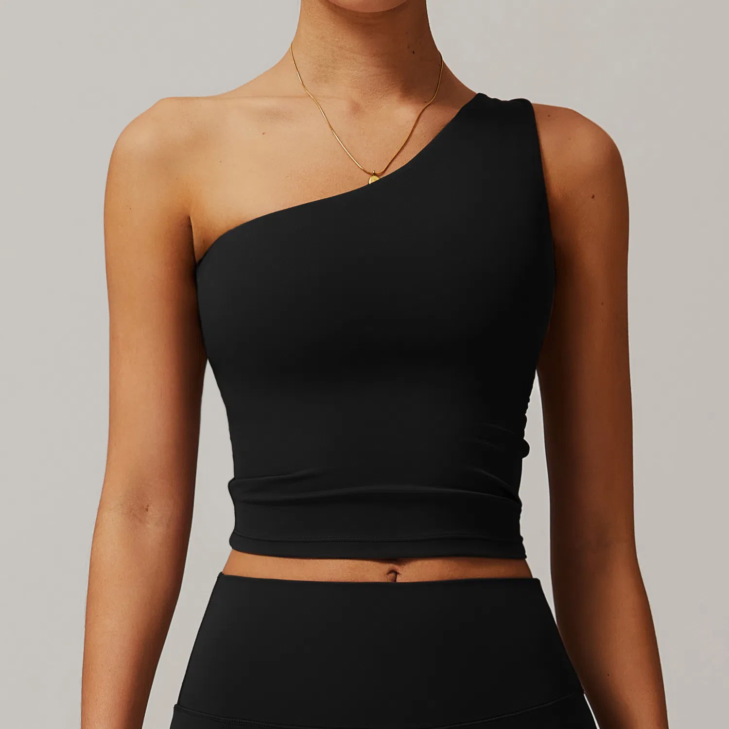 Novo Design Top Cropped Assimétrico Secagem Rápida Alta Elasticidade Camisetas de Ginástica Shockproof Top Cropped com Almofadas