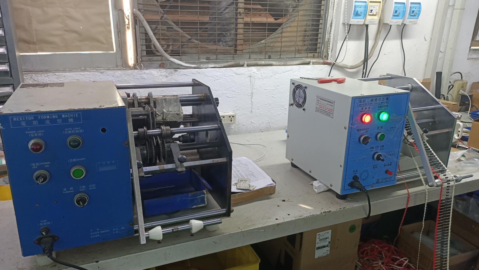 Resistance molding machine for polymer encapsulation of electronic components at CN Electronics
