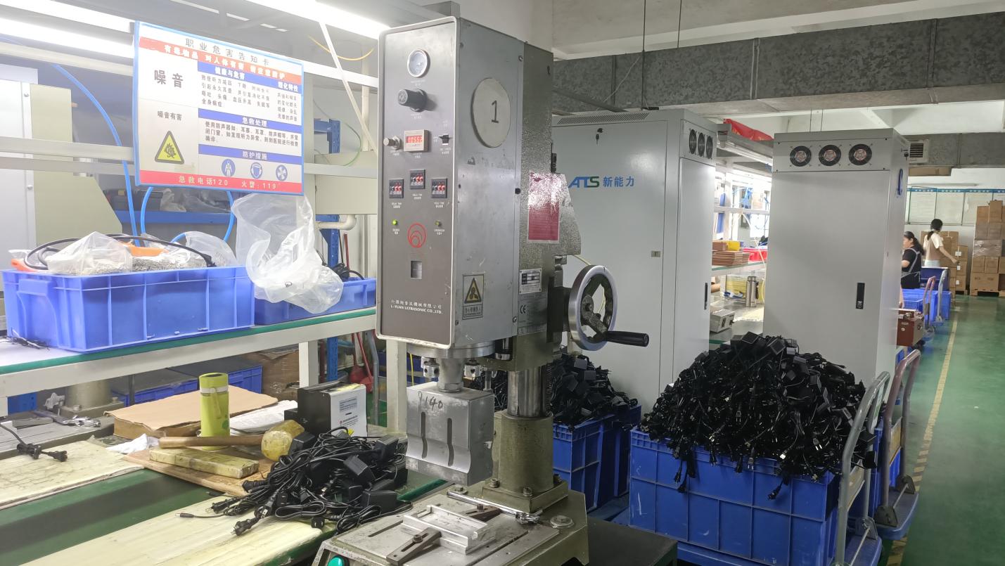Ultrasonic welding machine for plastic housing and component bonding at CN Electronics