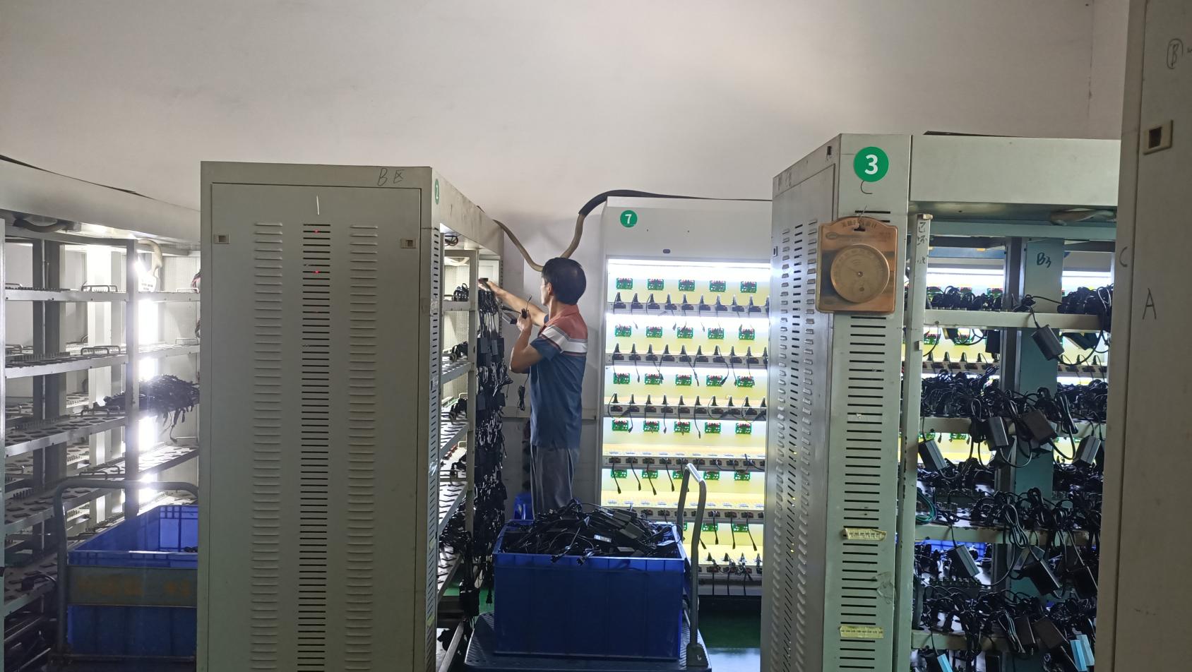 Burn-in aging test station for electronics reliability verification at CN Electronics quality lab