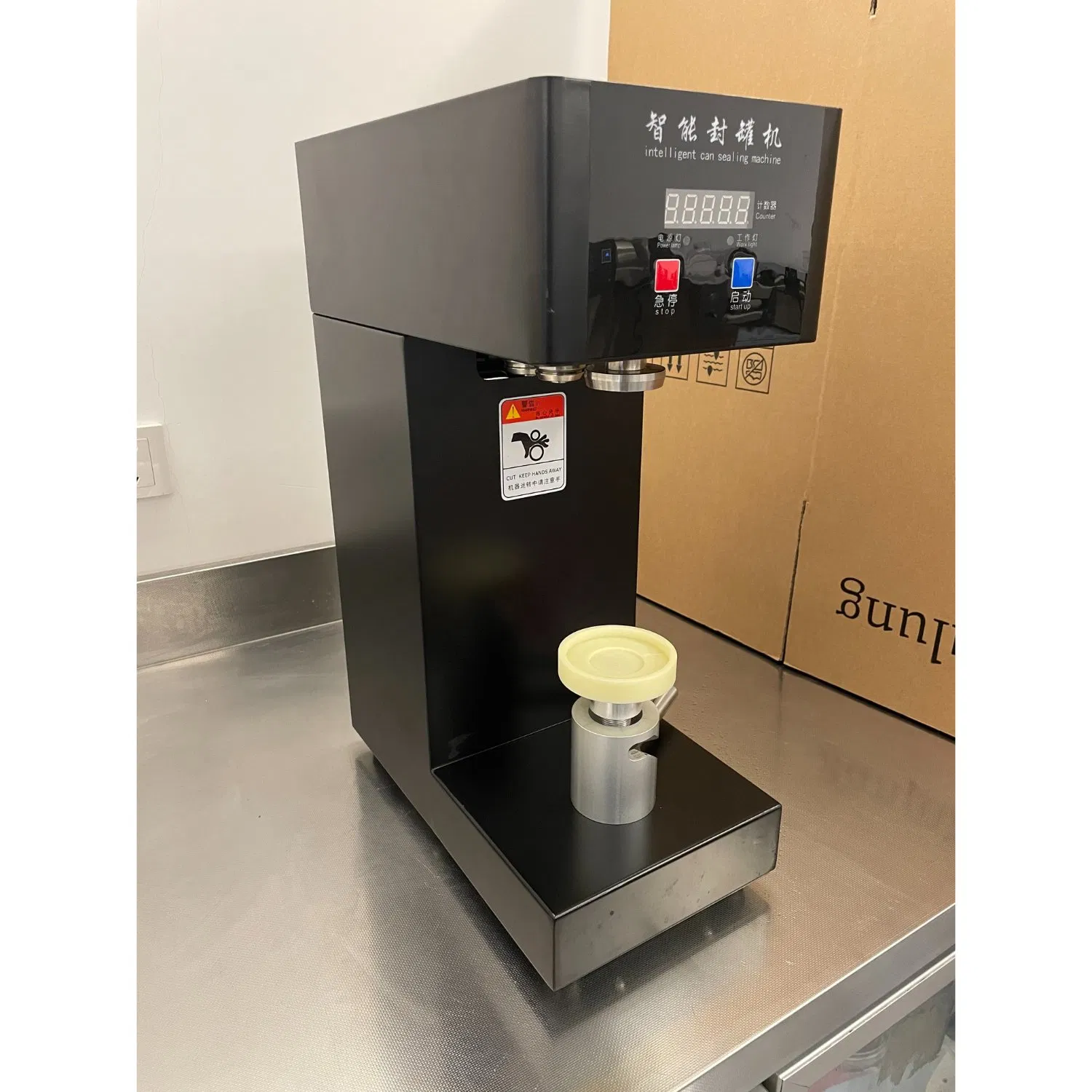 Black Semi-Automatic Tin Can Sealing Seaming Mach Intelligent Small Portable Plastic Beer Canning Juice Coffee Cup Lid Sealing Machine (QLS-180B-180W-220V.50Hz)