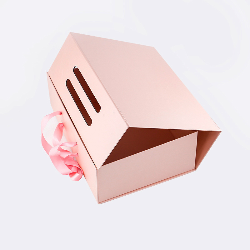 Caja de regalo de cartón rígido plegable de lujo con impresión colorida personalizada, magnética, rosa, con asa de cinta