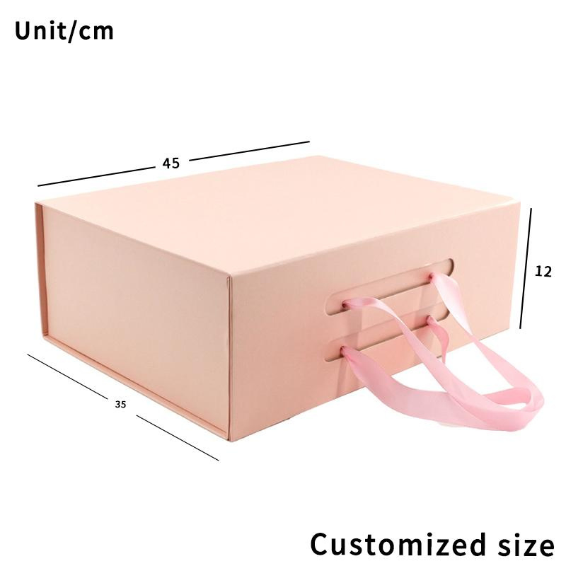 Caja de regalo de cartón rígido plegable de lujo con impresión colorida personalizada, magnética, rosa, con asa de cinta