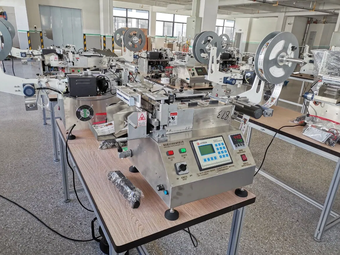 Jq-3012 Jingda Hot and Cold Knife Cloth Label Cutting Machine for Garment Wash Care Labels, Polyester Satin Ribbon, Cotton Tape, Nylon Taffeta and Paper