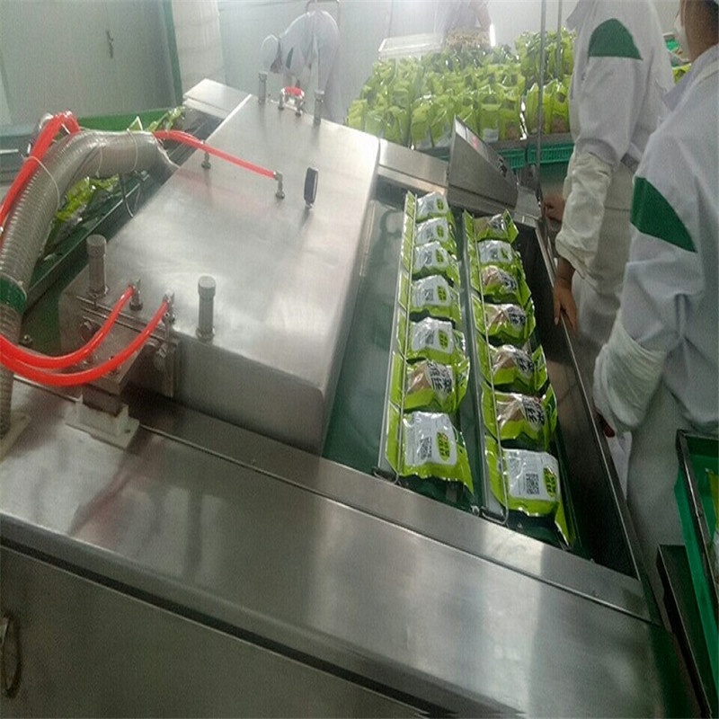Easy to Clean Maintain Assembly Line Vacuum Machine Conveyor Belt Vacuum Packing Machine for Bacon Sausage Packaging
