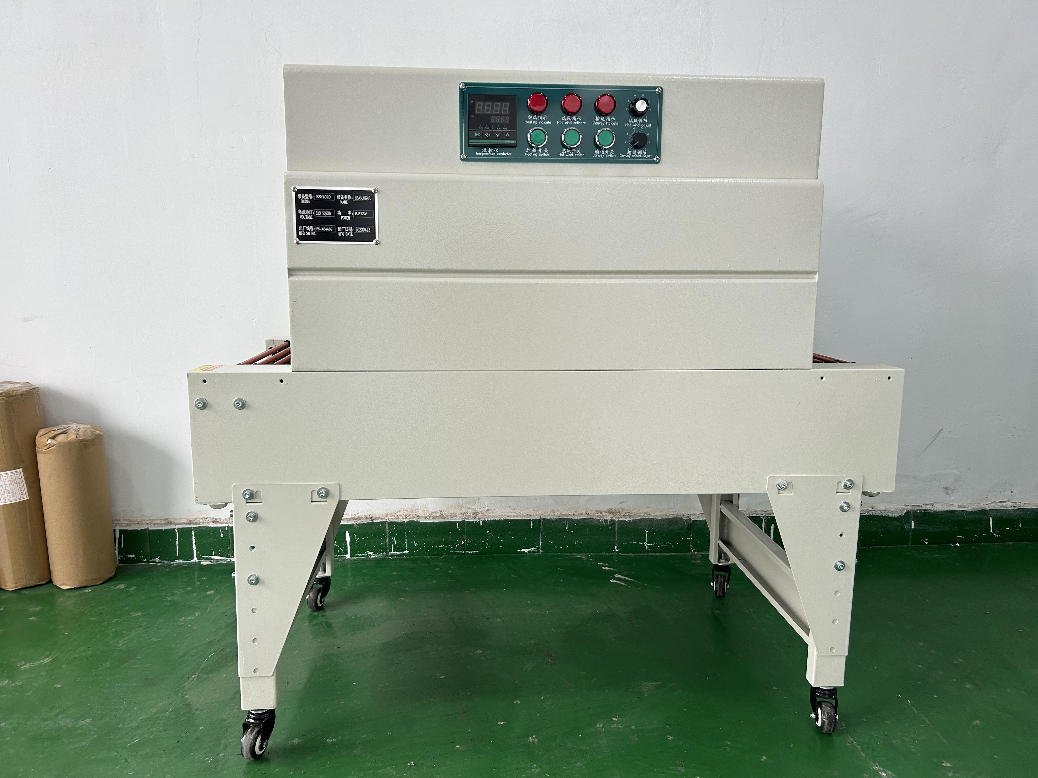 Automatic Electric Tunnel Shrink Packing Machine for Apparel Textiles Food BOPP/Masking Tape Film Packaging Motor Wood/Plastic