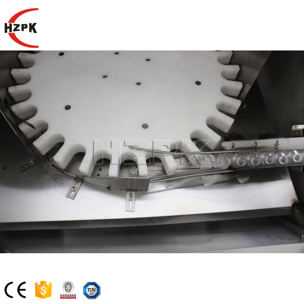 HZPK Automatic High Speed Rotary Plastic Pet Round Bottle Unscrambler Machine Bottling Turntable Bottle Feeder