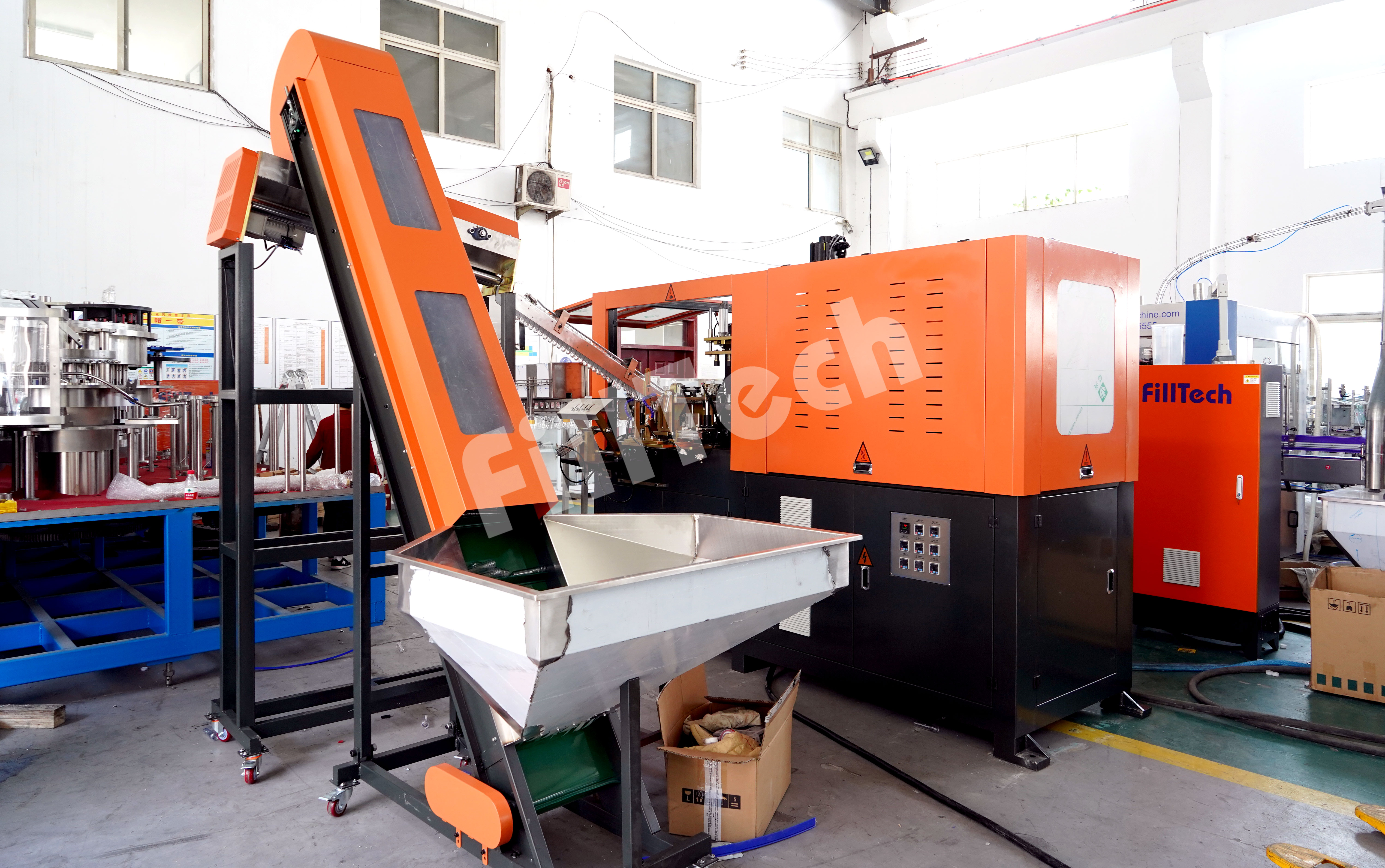 Bottle blowing machine