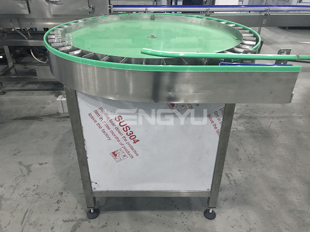 Semi Automatic Unscrambler Bottle Loading Turntable Rotary Feeder System Bottle Sorting Small Glass Pet Round Bottle Machinery