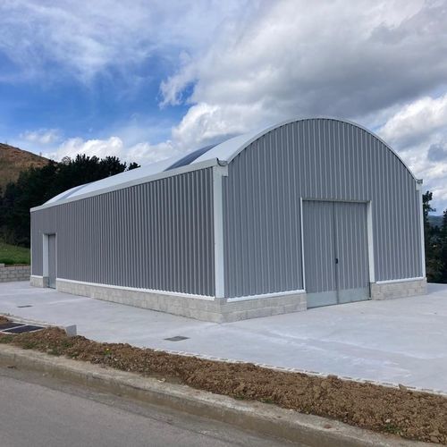 High Wind Resistant Steel Structure Warehouse with Enhanced Anchoring for Workshop