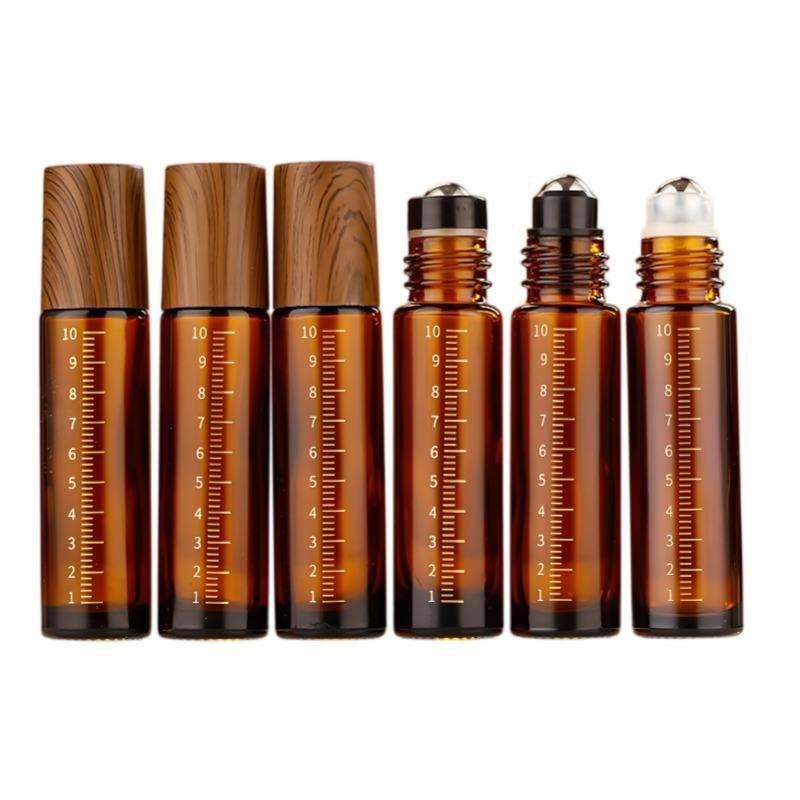 Hot Sale Wholesale 5ml 10ml Amber Glass Roll-on Bottle Essential Oils Perfumes Bottle Scale Glass Perfume Roll Ball Bottle with Wood Cap