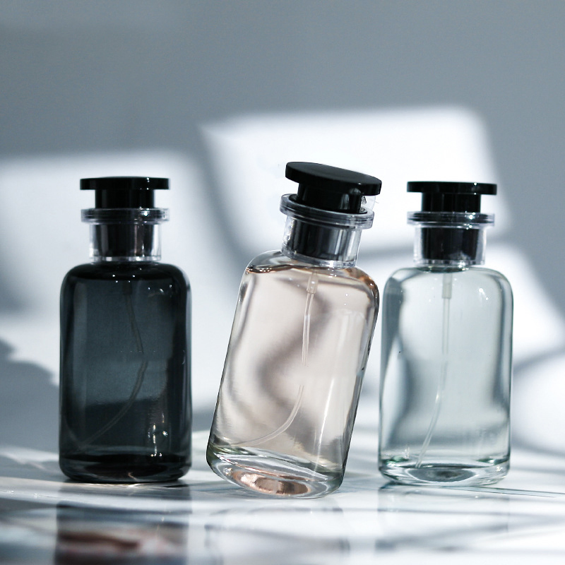 Wholesale Modern Gradient Black 30ml 50ml 100ml Luxury Round Spray Cylinder Custom Glass Perfume Bottle with Lid Box
