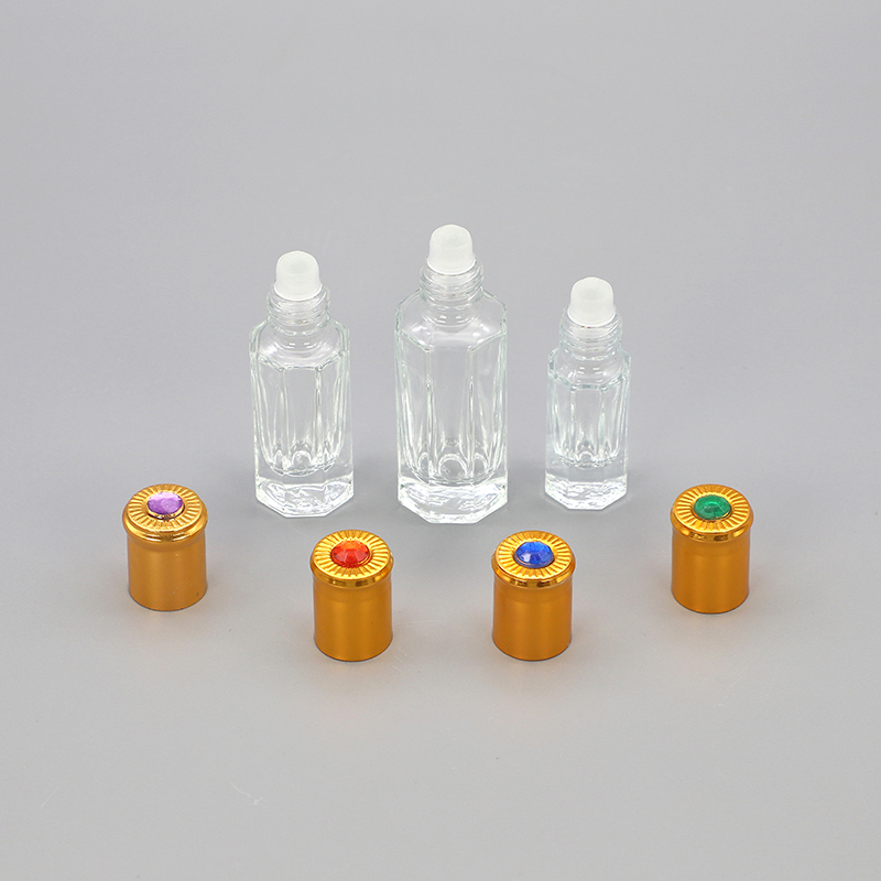 Wholesale Luxury Empty 3ml 6ml 9ml 12ml Clear Long Perfume/Roller on/Octagonal Attar Glass Bottle with Golden Crystal Gold Cap Roll on Essential Oil Rod
