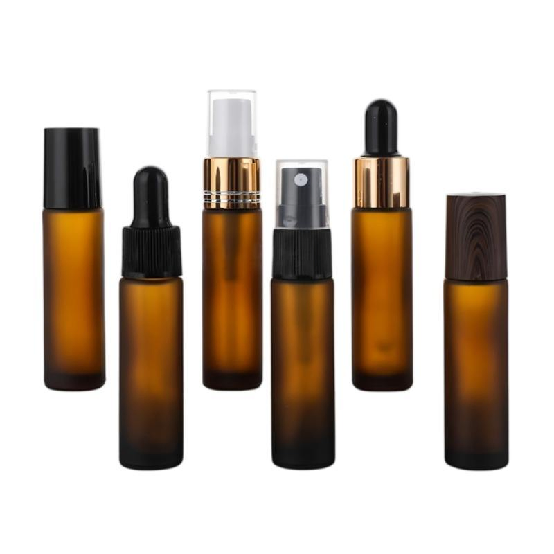 Hot Sale Wholesale 5ml 10ml Amber Glass Roll-on Bottle Essential Oils Perfumes Bottle Scale Glass Perfume Roll Ball Bottle with Wood Cap