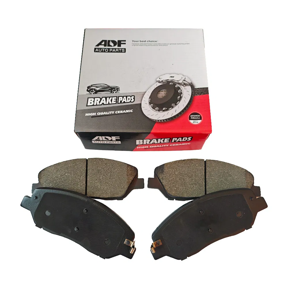 D1202 Pastillas de freno cerámicas semi metálicas resistentes al desgaste forros de freno accesorios especiales para sistemas de frenos de automóviles