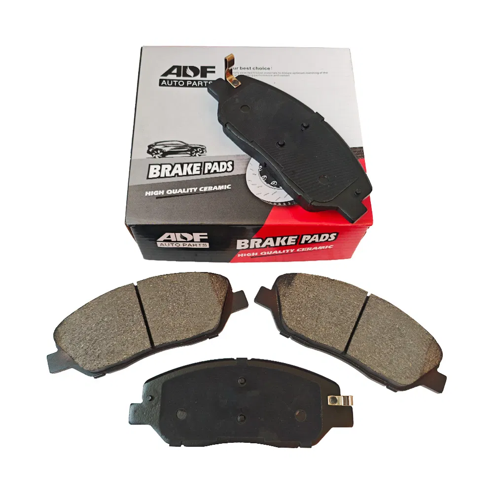 D1202 Pastillas de freno cerámicas semi metálicas resistentes al desgaste forros de freno accesorios especiales para sistemas de frenos de automóviles