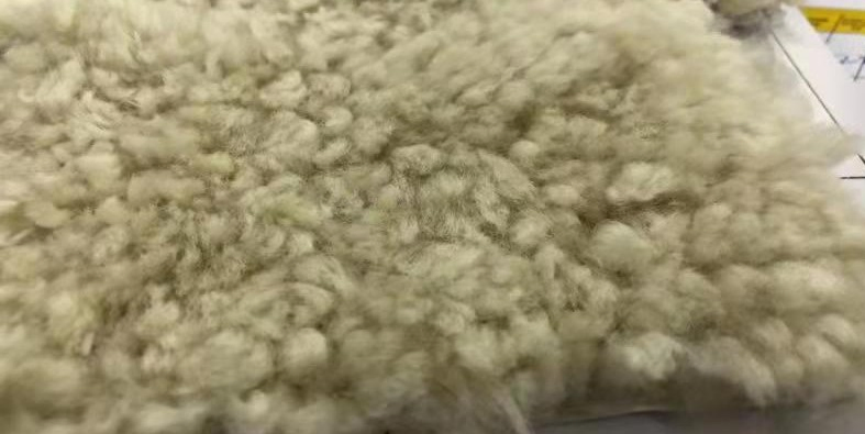 Factory Sale Curly Lambskin Fabric Genuine Fur Material for Upholstery in Sweden