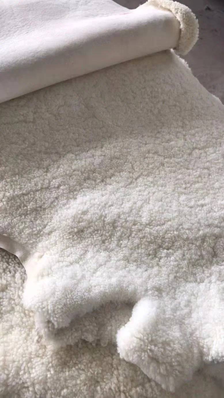 Factory Sale Curly Lambskin Fabric Genuine Fur Material for Upholstery in Sweden