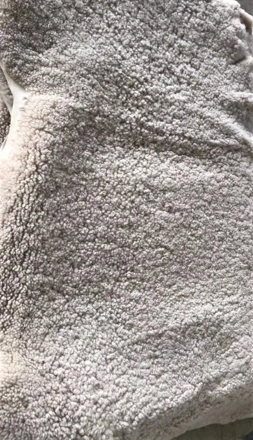 Factory Sale Curly Lambskin Fabric Genuine Fur Material for Upholstery in Sweden