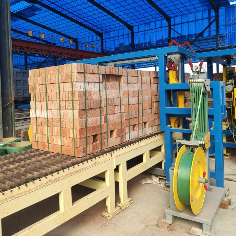 Automated Strapping System with One Flow Tensioning Cutting and Welding Process