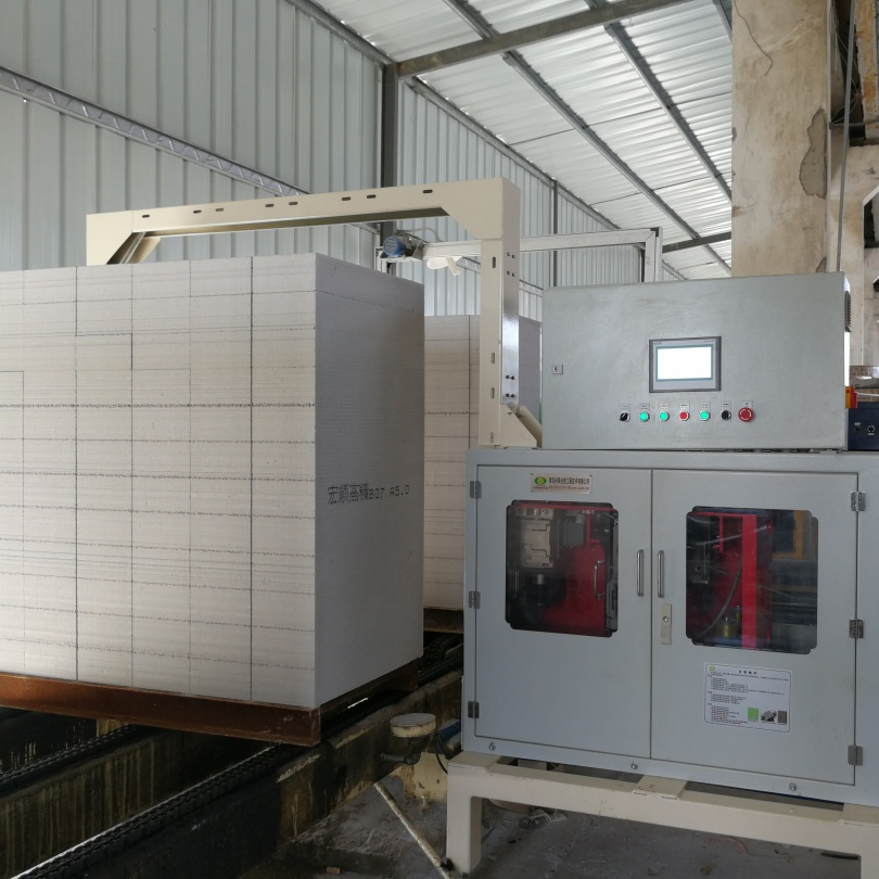 Automated Strapping System with One Flow Tensioning Cutting and Welding Process