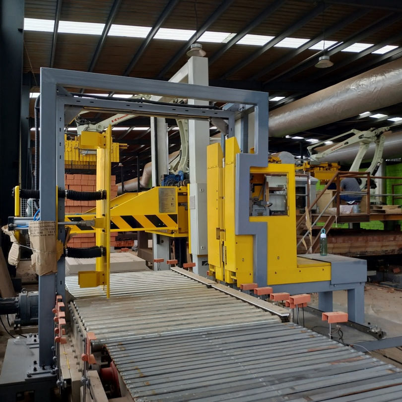 Automated Strapping System with One Flow Tensioning Cutting and Welding Process