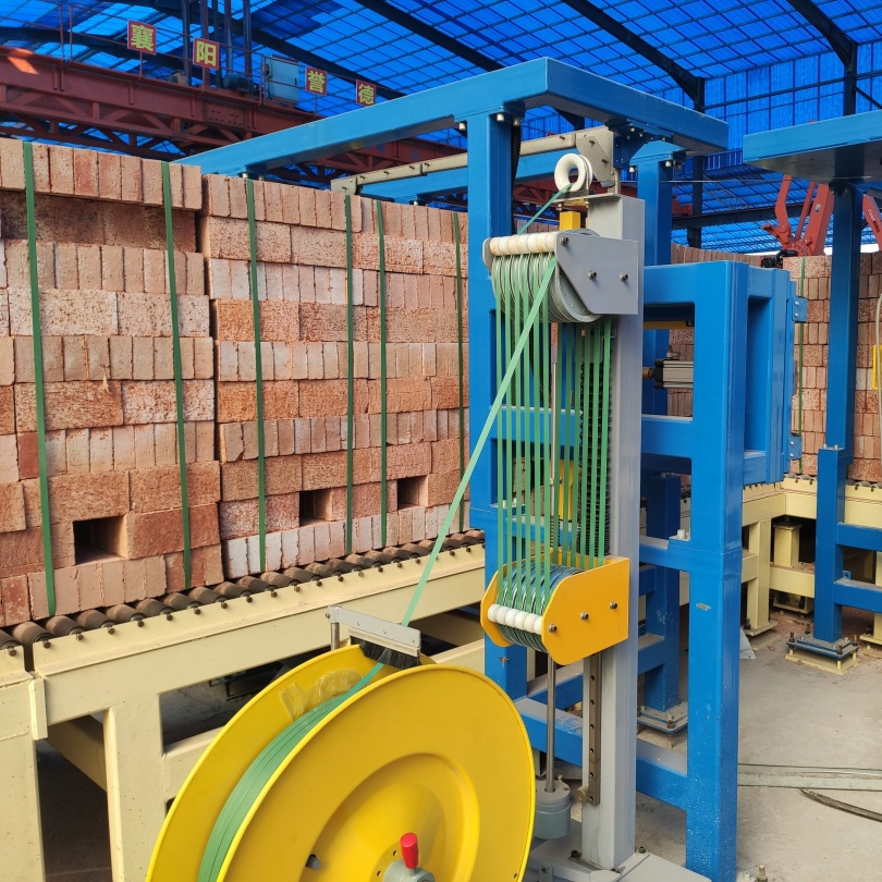 Automated Strapping System with One Flow Tensioning Cutting and Welding Process