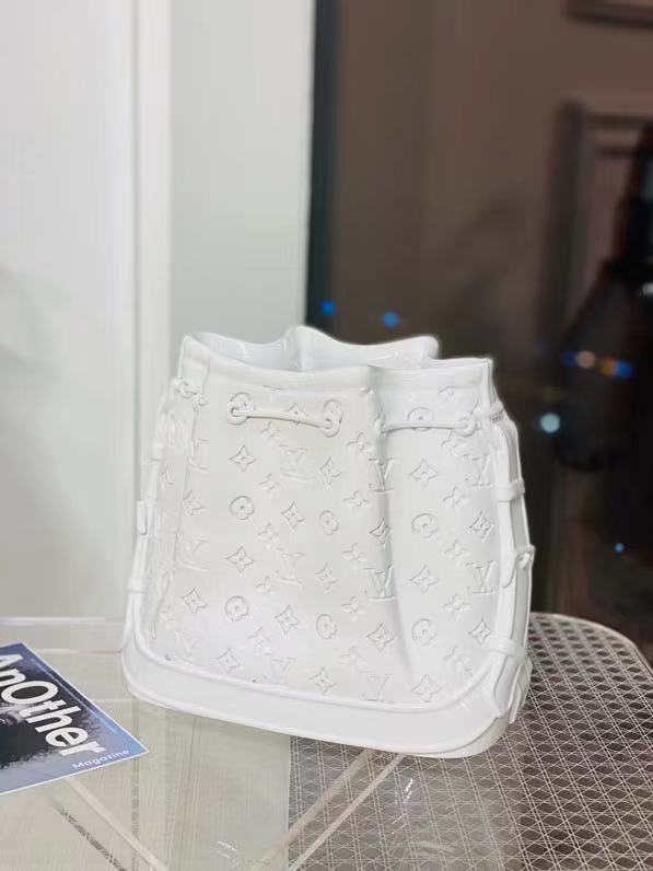 Wholesale new ceramic vase ornament Made to the exact dimensions of the Noé BB handbag, this porcelain vase is a testament to the brand's craftsmanship. Manufacturers, Suppliers