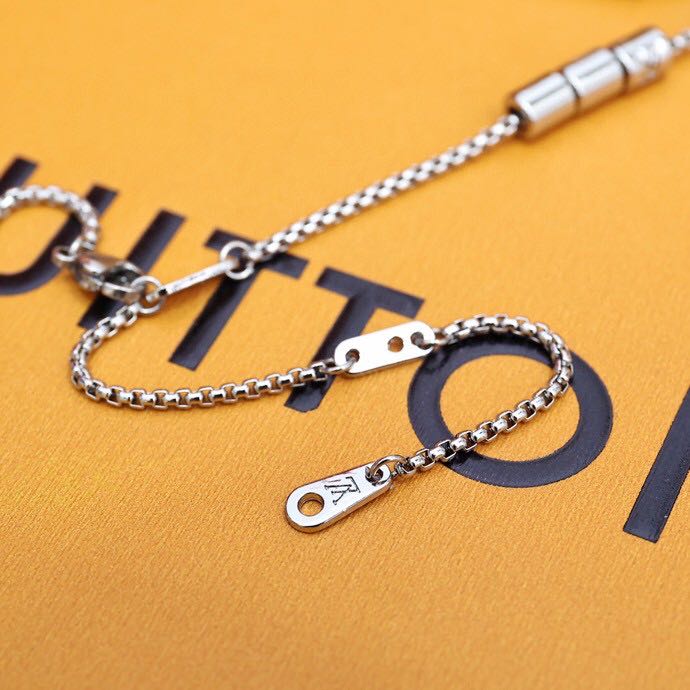 China LV PARADISE NECKLACE The LV Paradise necklace welcomes the new season with pop brilliance. Staggered arrangement of metal and resin beads , the chain link is engraved with Monogram pattern, showing exquisite Italian craftsmanship, Pairs well with the same pieces from the capsule collection. Suppliers, Exporters