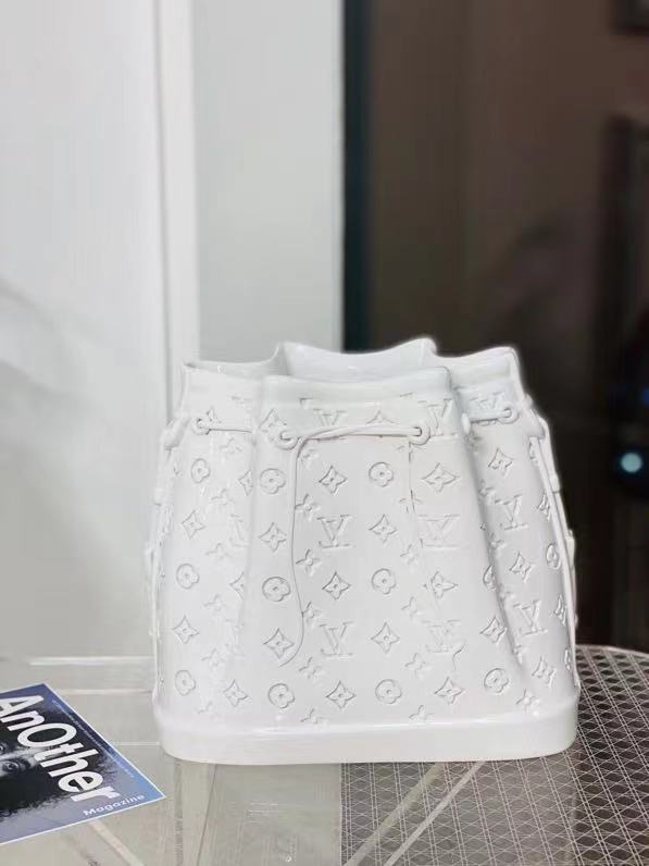 Wholesale new ceramic vase ornament Made to the exact dimensions of the Noé BB handbag, this porcelain vase is a testament to the brand's craftsmanship. Manufacturers, Suppliers