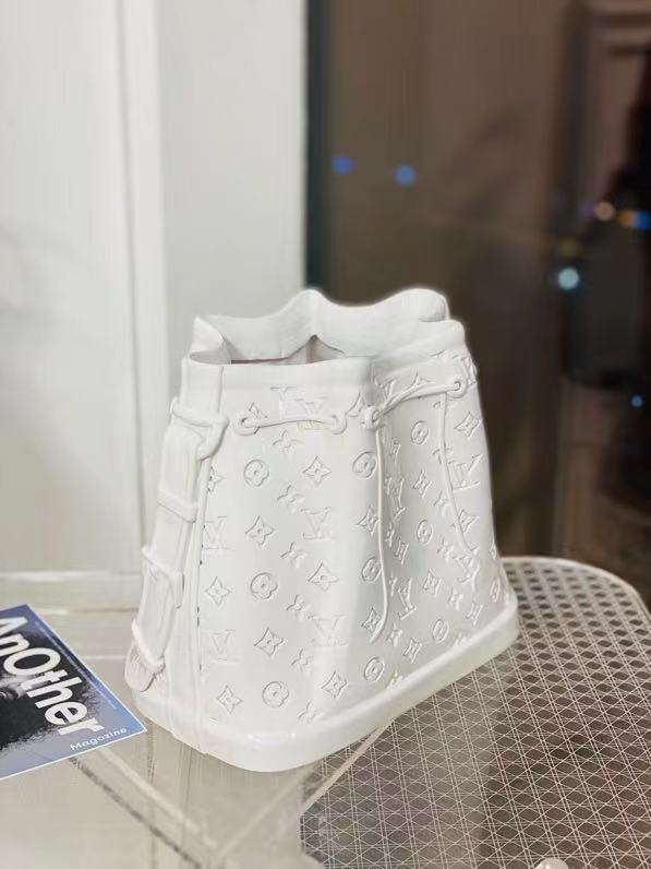 Wholesale new ceramic vase ornament Made to the exact dimensions of the Noé BB handbag, this porcelain vase is a testament to the brand's craftsmanship. Manufacturers, Suppliers
