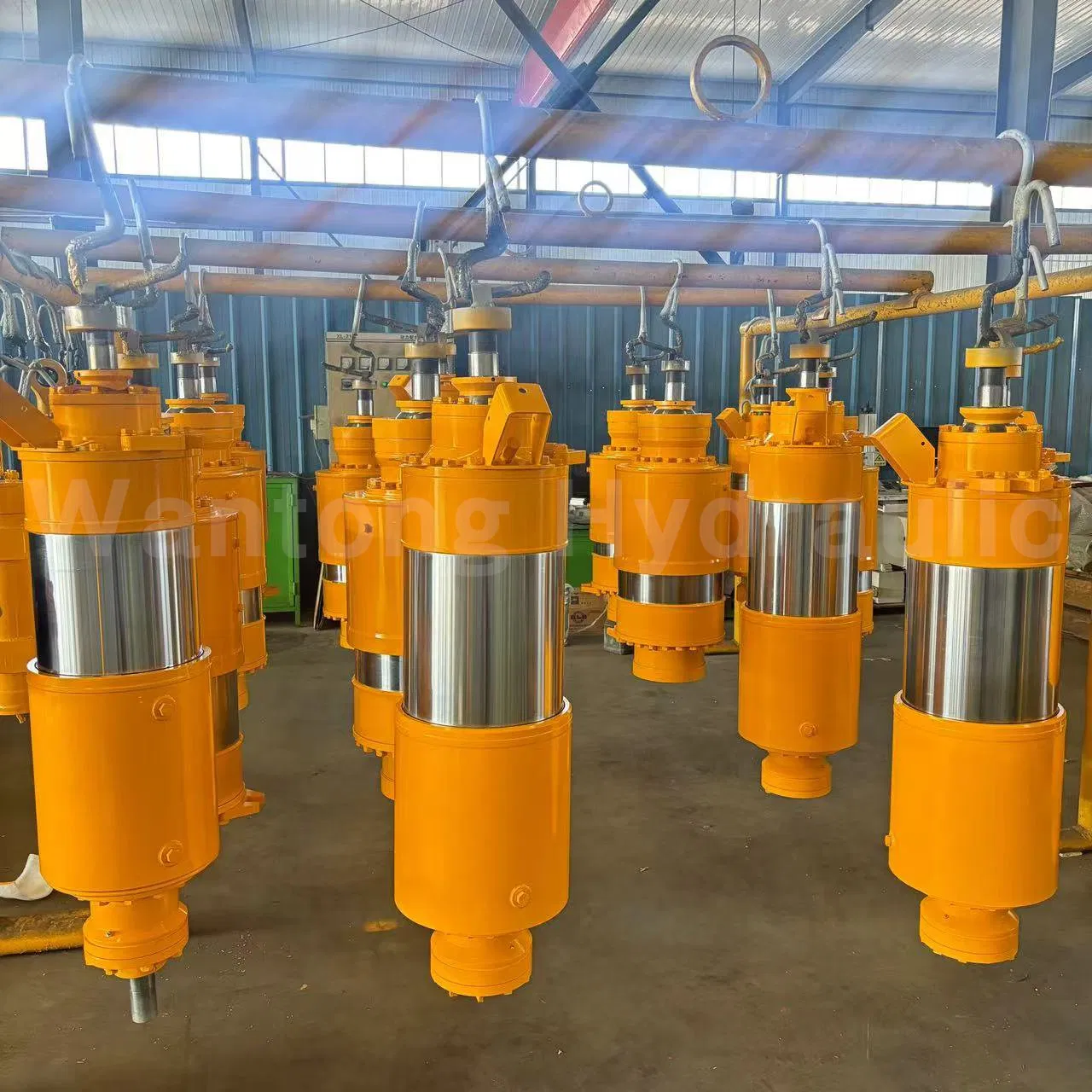 Sistema de suspensión hidro-pneumática ajustable con cilindro hidráulico e sistema inteligente integrado para camiones de volquete de carrocería ancha