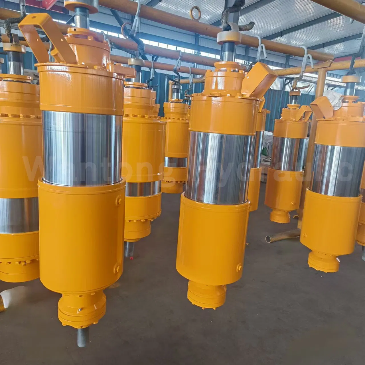 Sistema de suspensión hidro-pneumática ajustable con cilindro hidráulico e sistema inteligente integrado para camiones de volquete de carrocería ancha