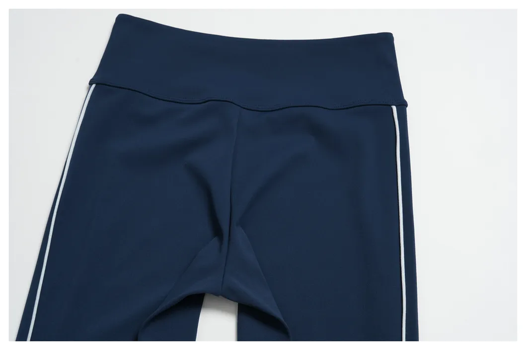 Leggings de capri de cintura alta al por mayor con detalle de franja lateral