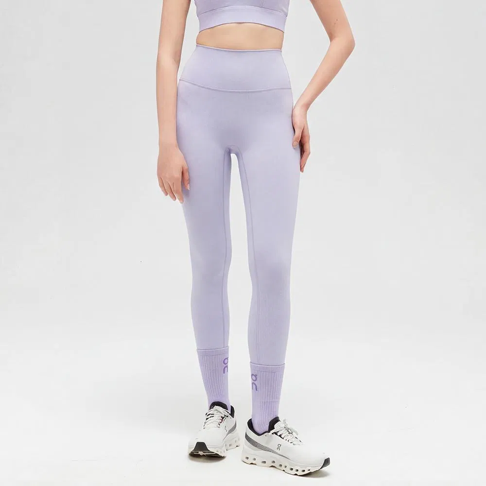 Mallas de yoga de nylon y spandex de sensación nude al por mayor, personalización de color y logo, pantalones de fitness transpirables y anti-fricción