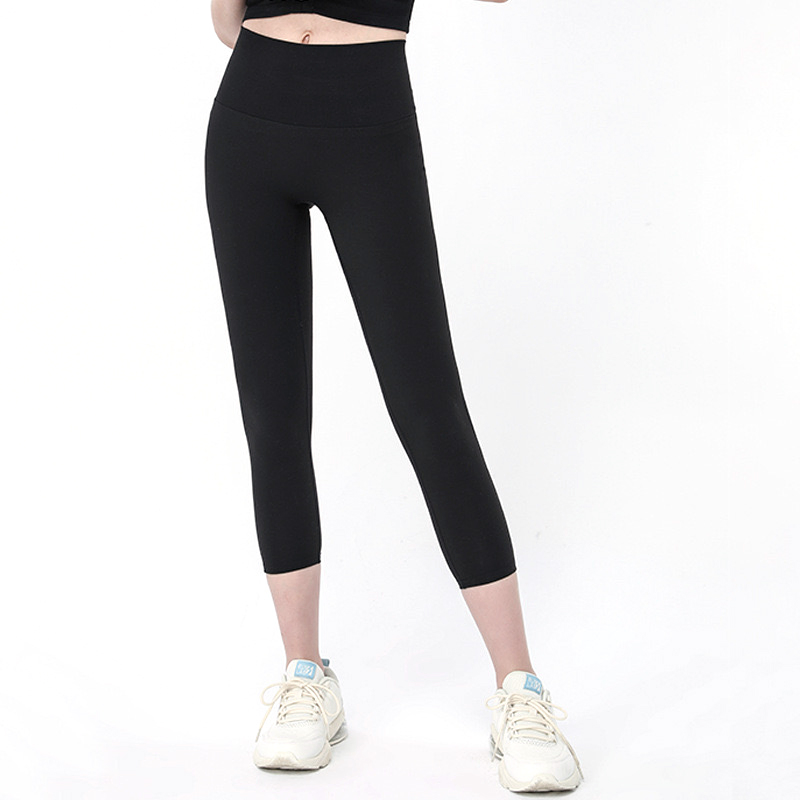 Pantalones deportivos sin costuras de alta venta para fitness, capris que levantan el trasero, leggings atléticos para danza, mallas activas para correr con bolsillos en la cintura trasera