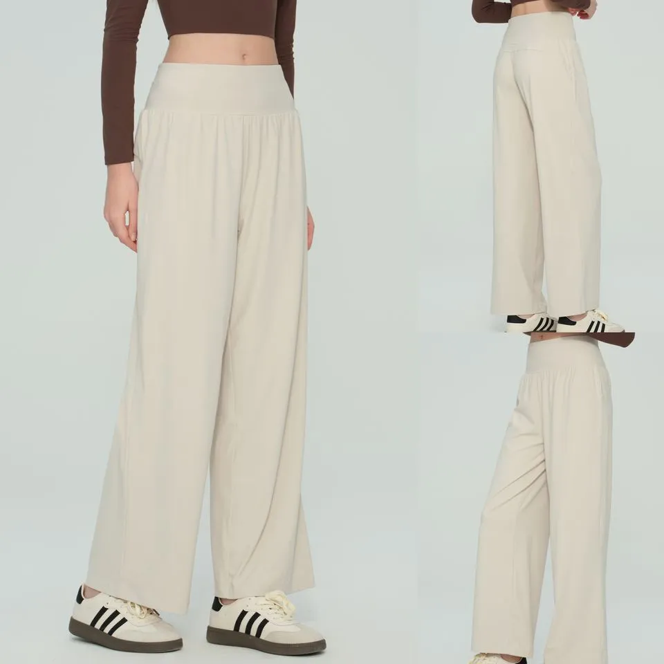 Detalle pantalones casuales cintura alta