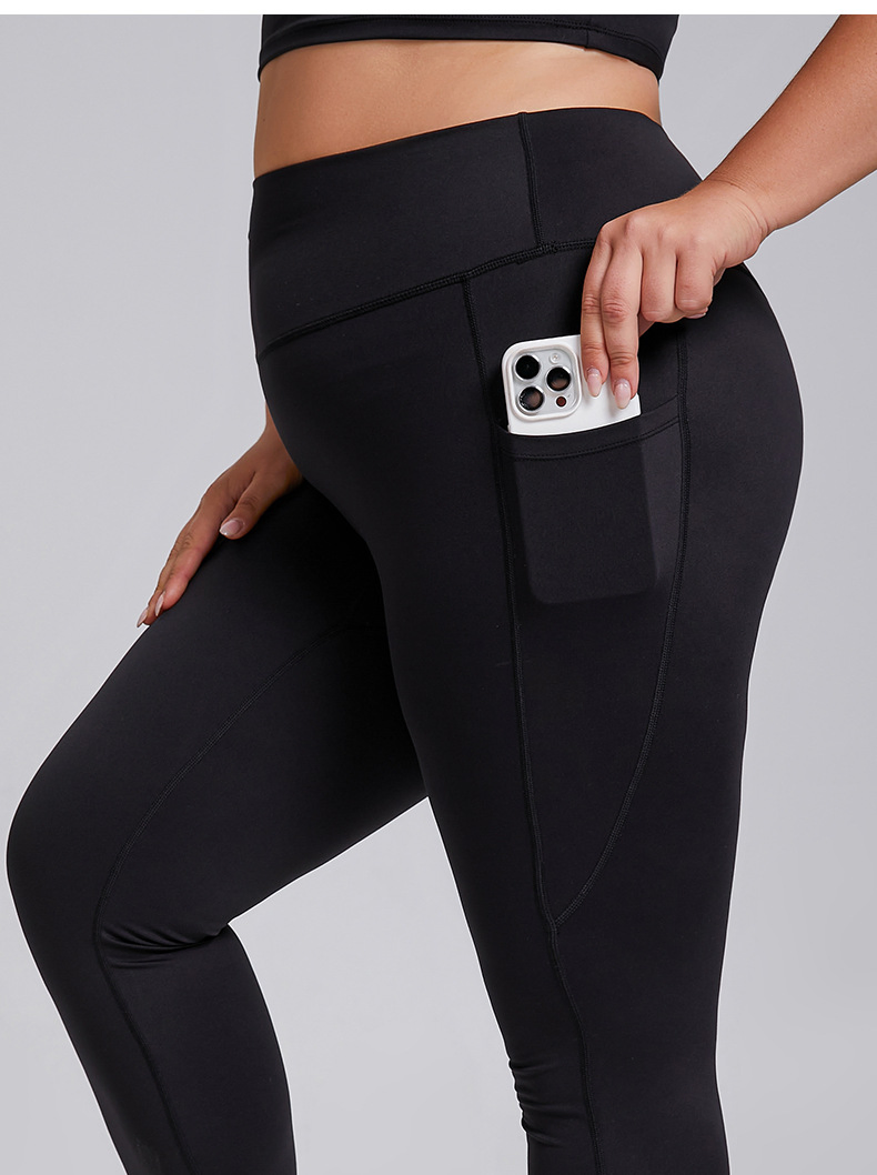 Pantalones de yoga ajustados sin costuras de talla grande con bolsillo para mujeres en el gimnasio