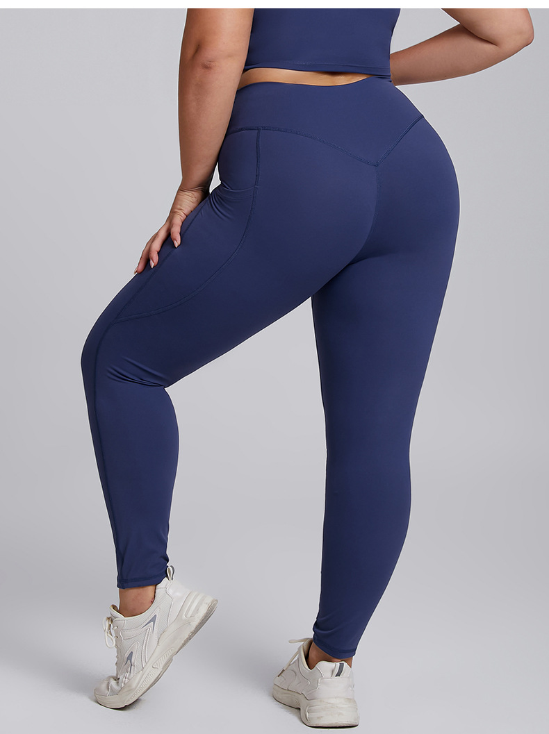 Pantalones de yoga ajustados sin costuras de talla grande con bolsillo para mujeres en el gimnasio