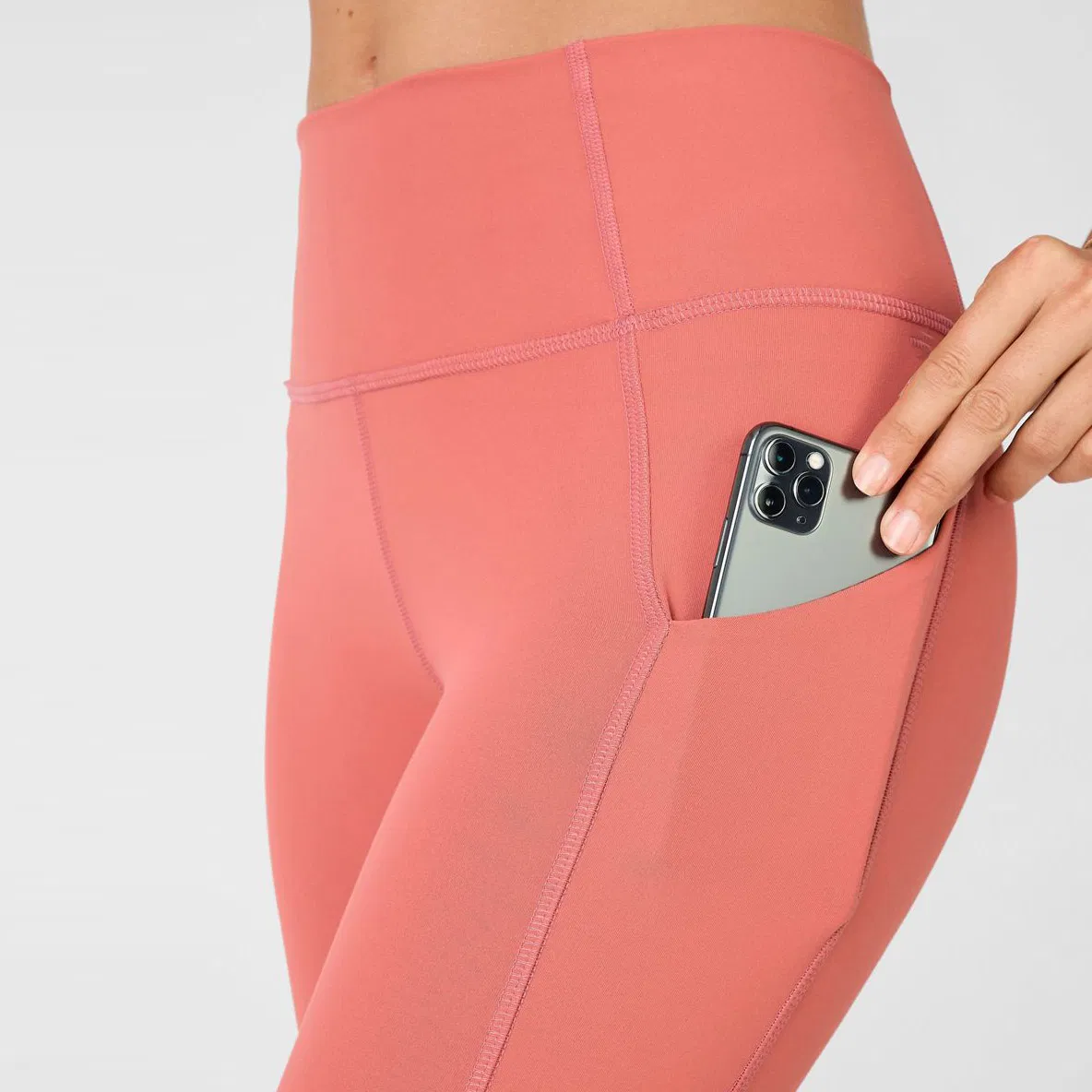 Pantalones de yoga ajustados de compresión para mujeres de Lycra al por mayor con bolsillos