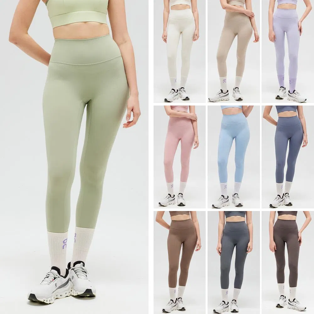 Mallas de yoga de nylon y spandex de sensación nude al por mayor, personalización de color y logo, pantalones de fitness transpirables y anti-fricción