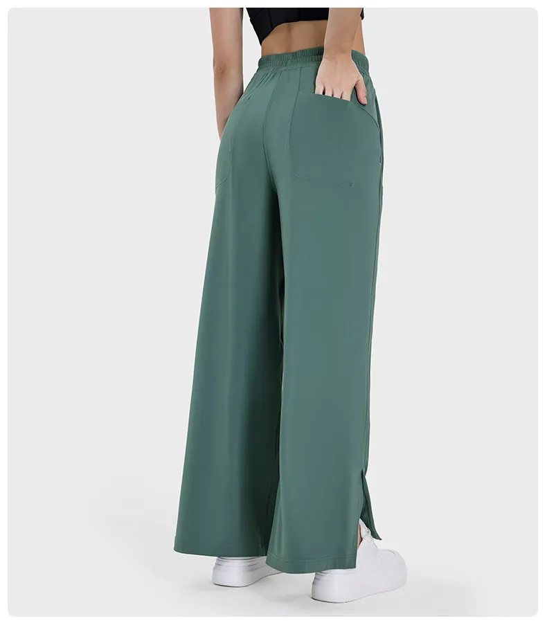 Pantalones de yoga elásticos con bolsillos laterales