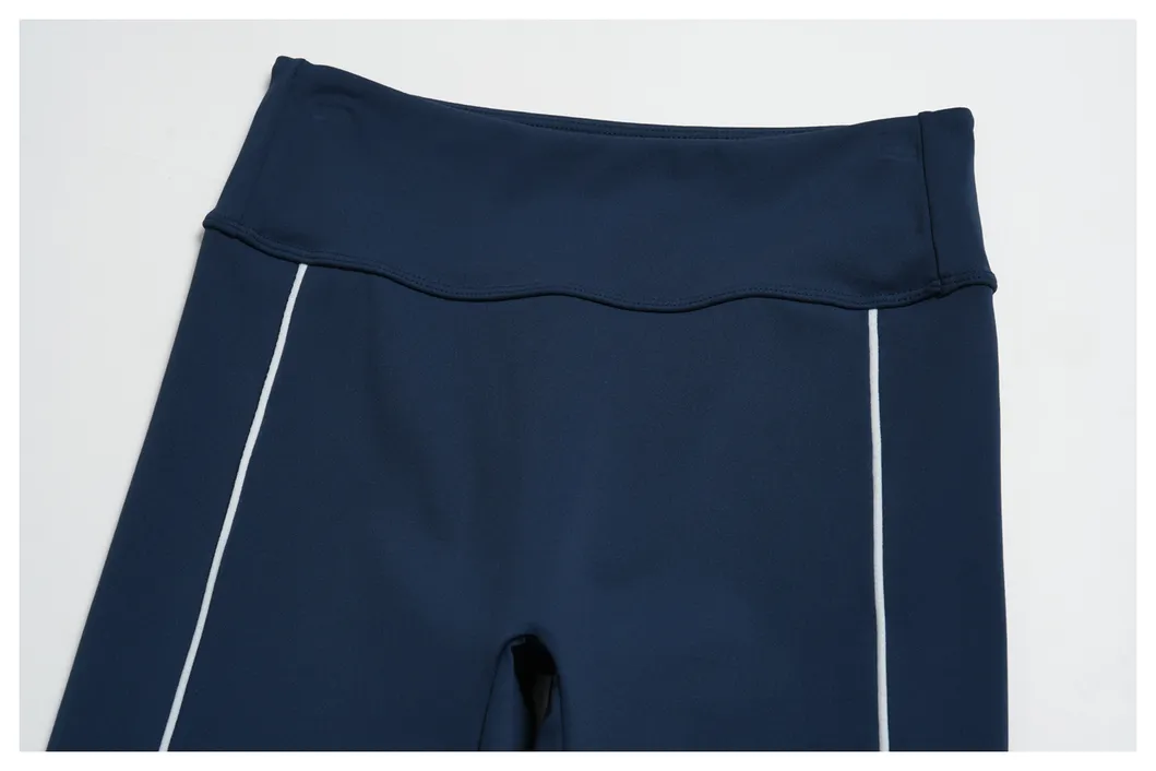 Leggings de capri de cintura alta al por mayor con detalle de franja lateral