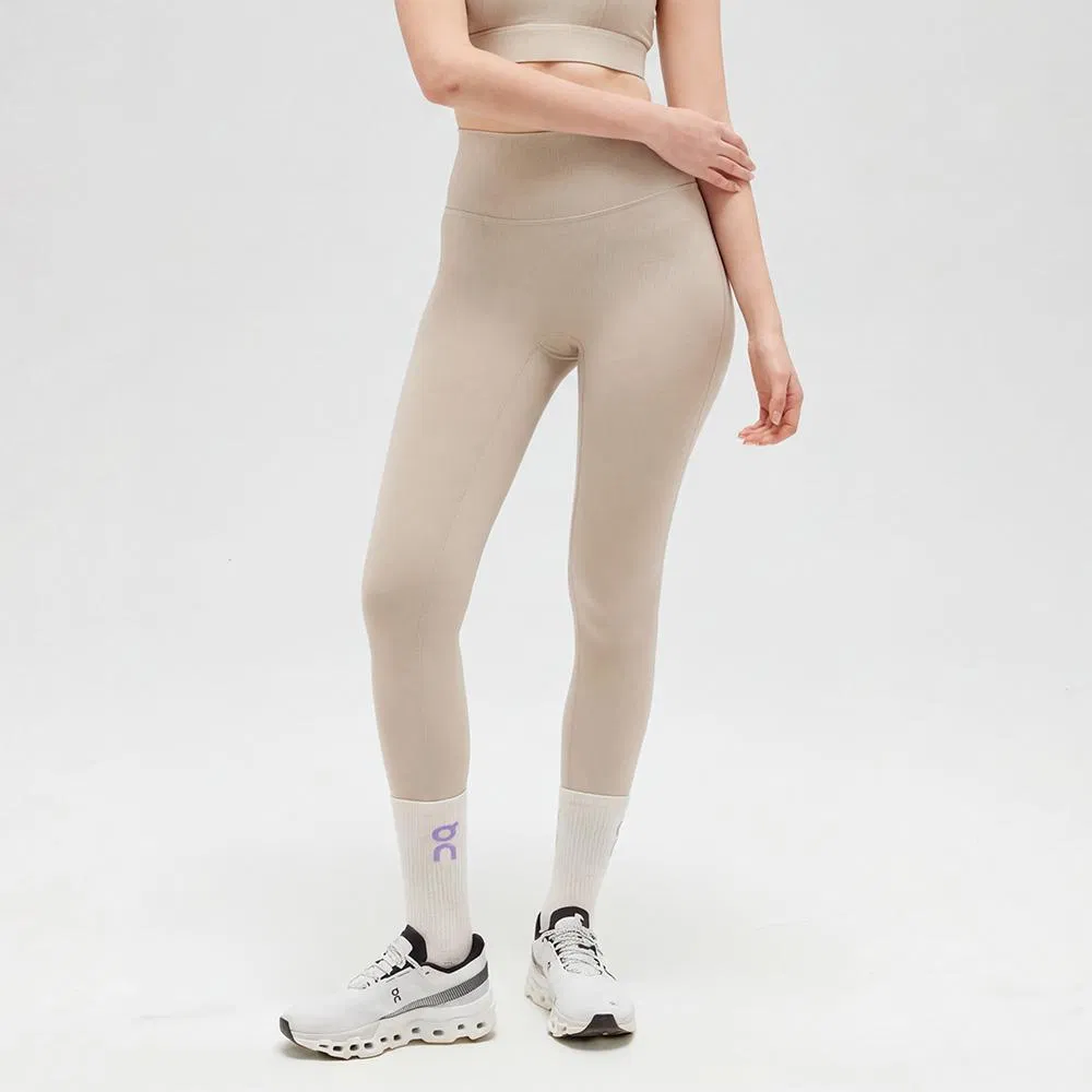 Mallas de yoga de nylon y spandex de sensación nude al por mayor, personalización de color y logo, pantalones de fitness transpirables y anti-fricción