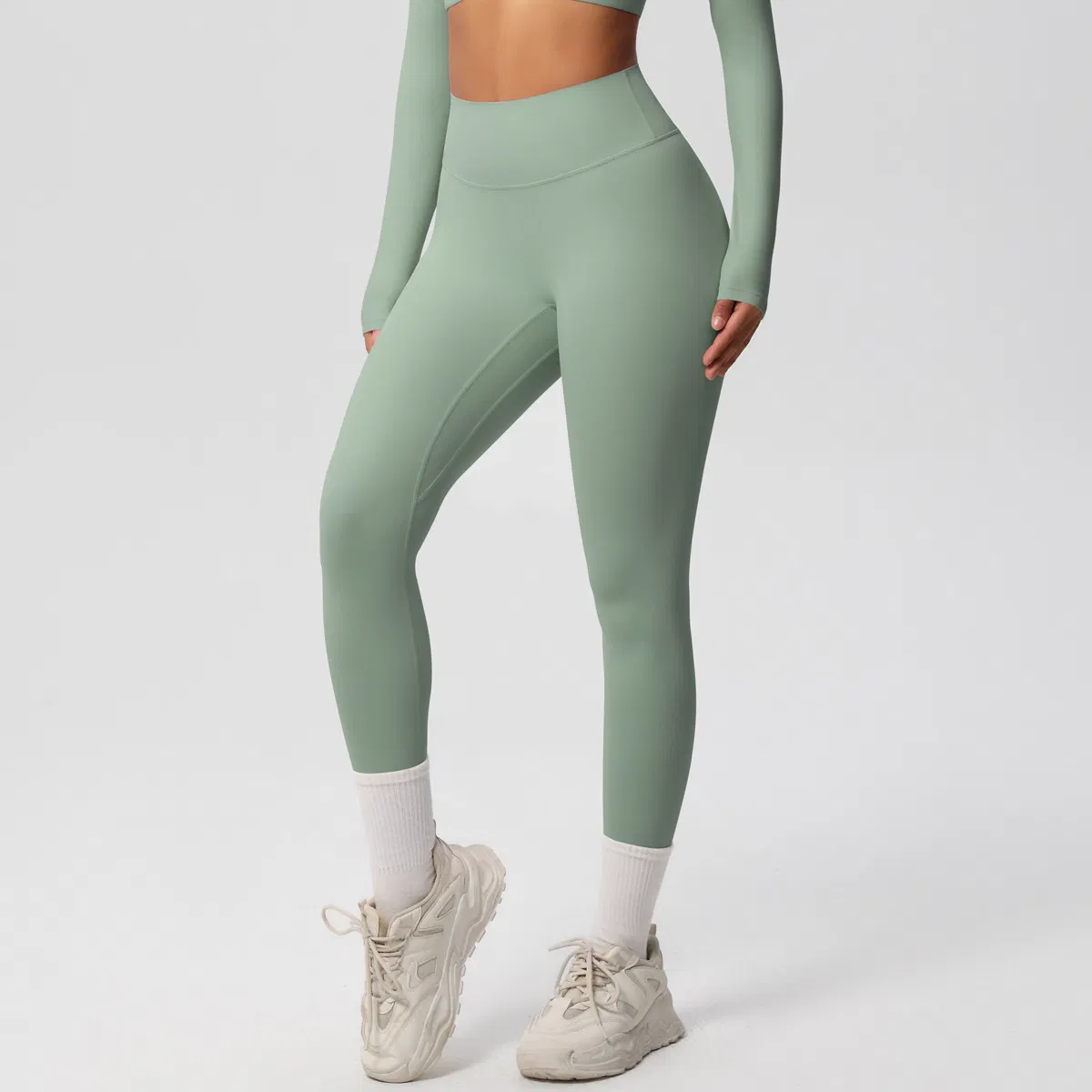 Conjunto de ropa deportiva de pantalones de yoga de color puro de Europa y América, manga larga, amigable con la piel, transpirable, hermosa espalda, camiseta de manga corta, ajustada para el entrenamiento
